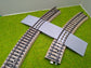 Bahnübergang H0 gebogen für Märklin M-Gleis - 58x40 mm - grau