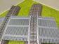Bahnübergang H0 gebogen für Märklin C-Gleis - 58x70 mm - grau